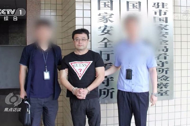 李孟居在中国被捕。(取自中国央视画面)